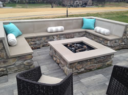 An outdoor custom fire pit on a patio