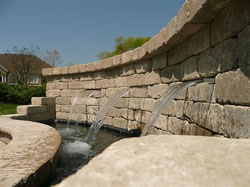 A nice outdoor water feature with waterfalls